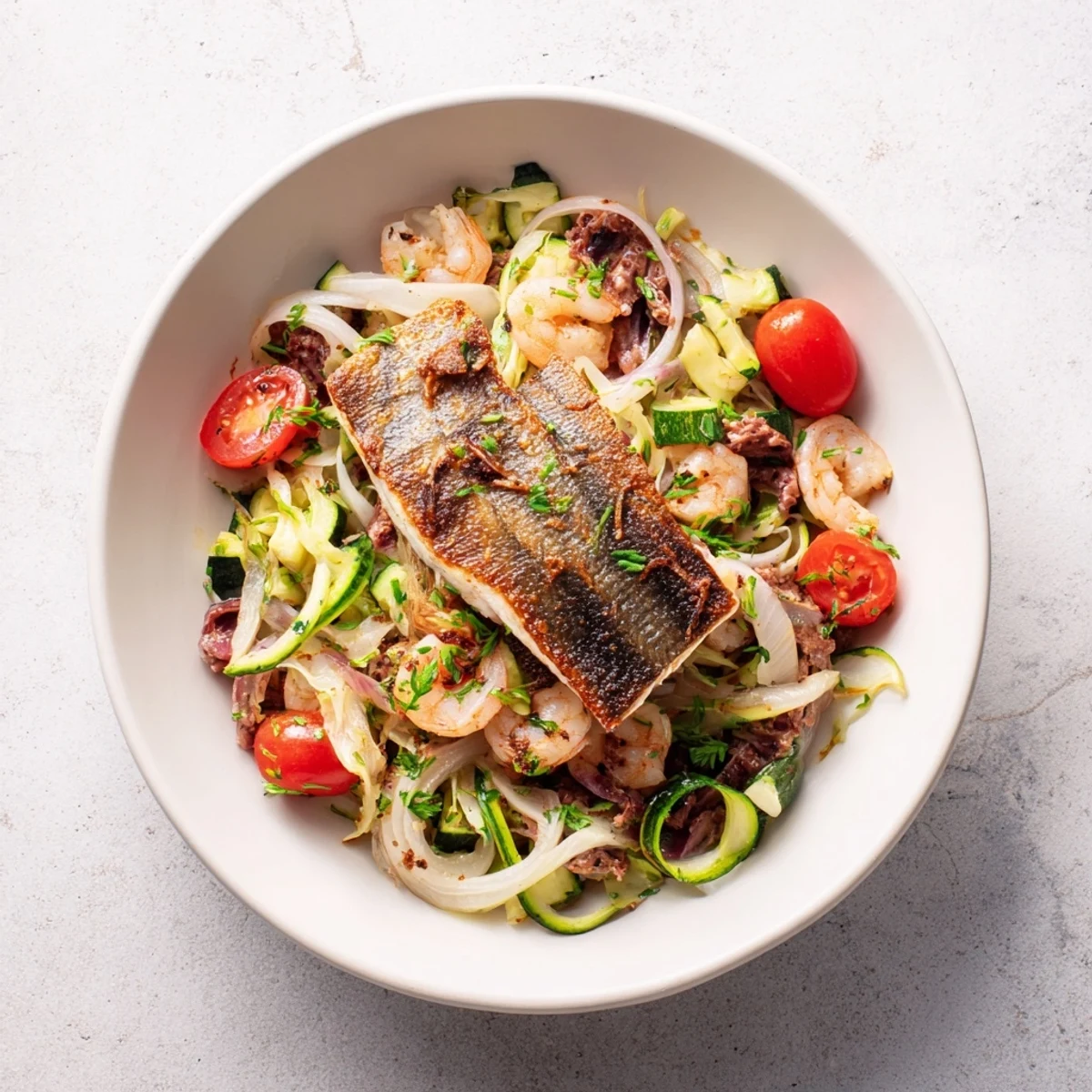 Brightly colored Plongeons dans l'Océan Poisson Bleu featuring delicate blue fish, fresh herbs, and a lemon-kissed sauce.