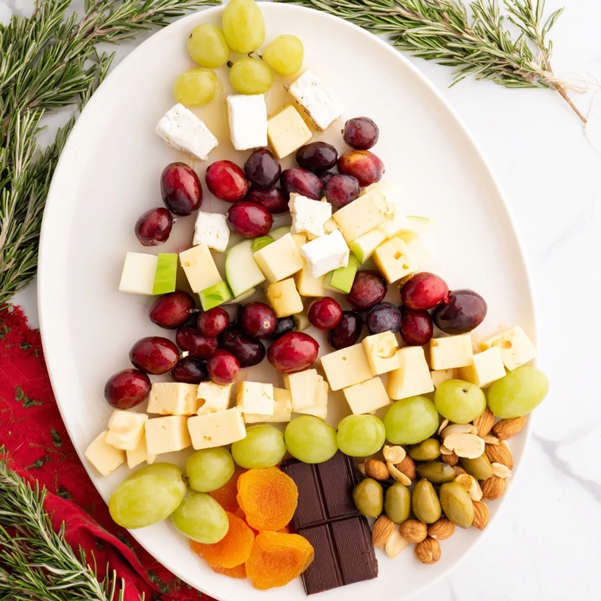 A delicious Cranberry Joy Tree Board with cubes of cheese and glistening fresh cranberries awaiting you.