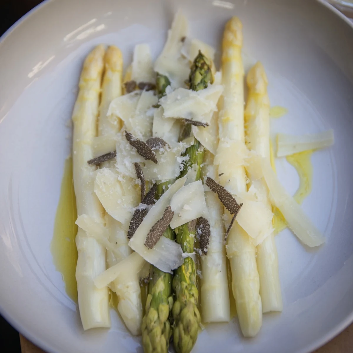The Silver Birch salad features tender white asparagus with shaved Comté and black truffle.
