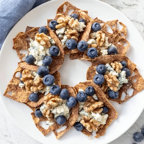 A vibrant platter shows the Olympic Rings Interlock, a colorful appetizer arrangement for a party.