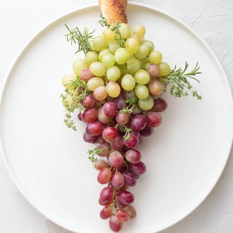 Fresh cluster of vineyard grapes ready to serve, a beautiful appetizer for any party.
