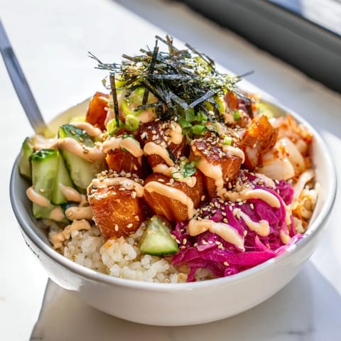 Vibrant Crispy Salmon Rice Bowl showcasing golden salmon and fluffy rice layers.  