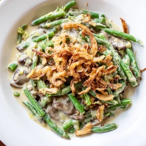 Creamy, classic Old-School Green Bean Casserole with golden crispy onions and tender green beans.
