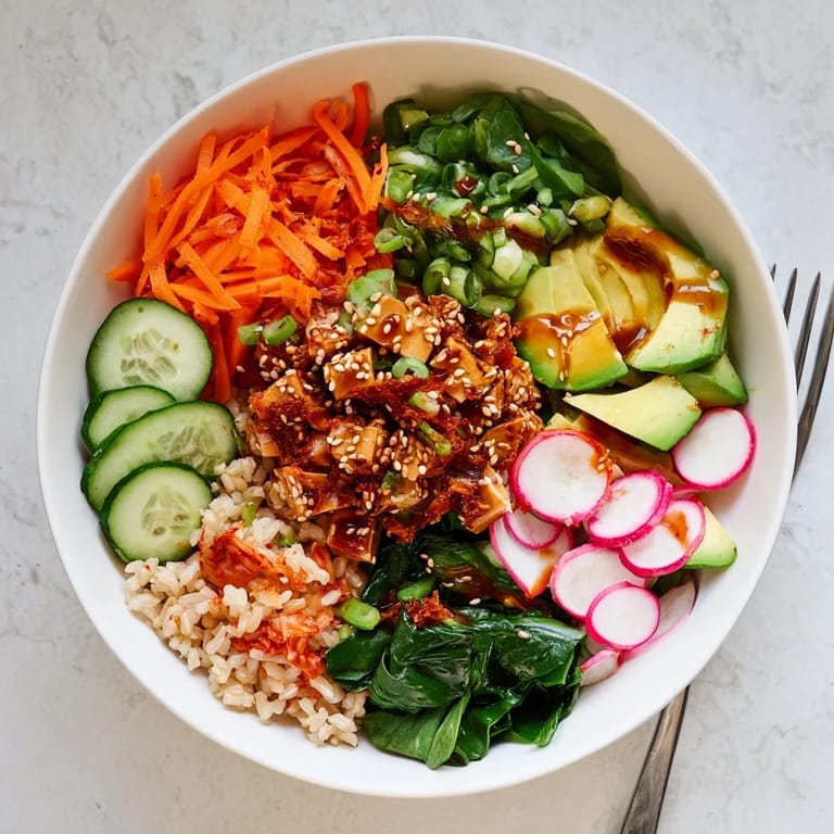 Delicious Fermented Vegetable Bowl featuring fresh vegetables, hearty grains, and zesty dressing.  