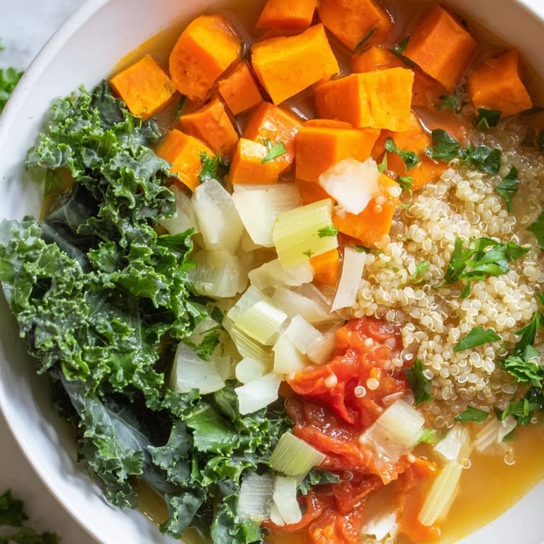 Close-up shot shows a comforting bowl of delicious Nourishing Winter Veggie Soup, full of fresh flavors.